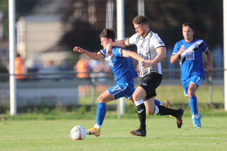 Strong defending from Ammanford.  Picture - Riley Sports Photography